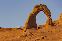 Tourists and Delicate Arch, Arches National Park, Utah