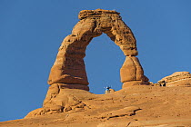 Tourists and Delicate Arch, Arches National Park, Utah