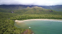 Boat in Zoe Bay surrounded by rainforest, Hinchinbrook Island National Park, Queensland, Australia