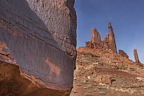 Petroglyph and rock formations, Moses and Zeus Spires, Canyonlands National Park, Utah
