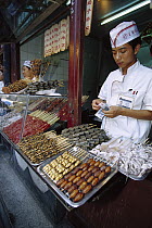 Food stall selling scorpions, cicada, and larva, Beijing, China