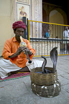Snake charmer inside the city palace, Jaipur, India