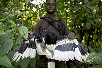 Bush meat hunter with kill, Boje Village, Cross River State, Nigeria