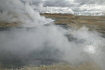 Steaming mud pot resulting from geothermal activity Namafjall, Iceland