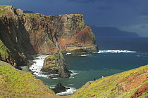 Tourists walking along rocky cliffs in the Ponta de Sao Lourenco Nature Reserve, Madeira