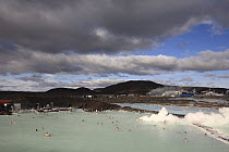 People bathing in geothermal baths next to Reykjavik geothermal power plant, Iceland