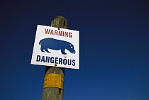 Hippopotamus (Hippopotamus amphibius) warning sign, Africa