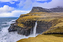 Waterfall on coast, Gasadalur, Iceland