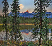 Moon over Mount Edith Cavell from Fryatt Pond, Jasper National Park, Alberta, Canada, digital composite