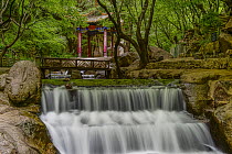 Temple and waterfall, Mount Mian, China