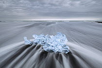 Ice chunk on beach, Diamond Beach, Jokulsarlon, Iceland