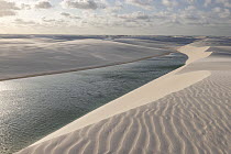 Freshwater lagoon amid sand dunes, Lencois Maranhenses National Park, Brazil