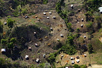 Aerial of east of Panama City, people dwell in simple housings on recently logged land