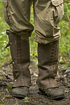 Researcher wearing leg guards as protection from poisonous snakes Santa Rosa National Park, Costa Rica