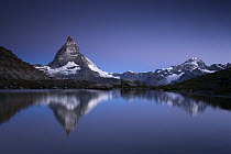 The Matterhorn with reflection in Riffelsee Lake, Alps, Switzerland