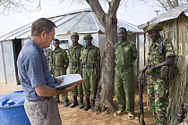 Ian Craig of Lewa Wildlife Conservancy meeting with rangers, buildings constructed by Lewa Wildlife Conservancy, Kenya