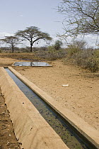 Wildlife waterhole built by Kalama Wildlife Conservancy, Kenya