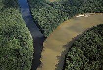 Blackwater river and silted river merging, Canaima National Park, Venezuela