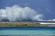 Waves crashing against reef's edges of the only Atoll in all of the South Atlantic Ocean, Rocas Atoll, Brazil