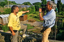 Bill Oddie presenting Bird in the Nest series with cameraman, 1994
