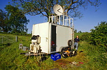Communications van in field for sending live pictures for Bird in the Nest series, 1995