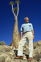 David Attenborough beside to Giant aloe (Aloe pillansii) South Africa, on location for BBC series Private Life of Plants, 1993