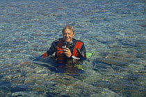 Sir David Attenborough in scuba gear,  Heron Island Australia. On location for  "Private Life of Plants" 1990s