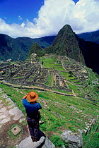 Machu Picchu (ancient Inca ruins) from the south with peak of Huayna Picchu in background. Peru, South America