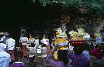Worshippers at Goa Lawah bat cave temple, Bali, Indonesia.
