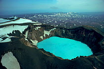 Blue sulphuric/hydochloric lake in volcano crater, Kamchatka, Russia