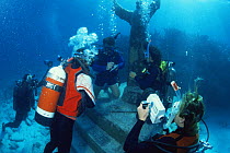 Underwater wedding next to statue of "Christ of the Deep" Florida, USA, Atlantic.