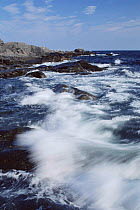 Waves breaking along shore St Lawrence Gulf, Canada