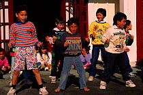 Maori children doing native dance. Rotorua, New Zealand