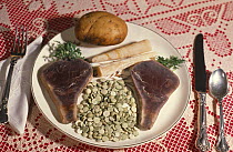 Rocks looking like chops, green peas, baked potato &andcarrots, Banquet of Rocks collection, USA
