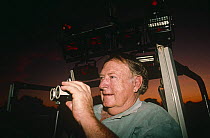 Vernon Baillie with infra-red lights to film leopard at night S. Lunagwa NP, Zambia