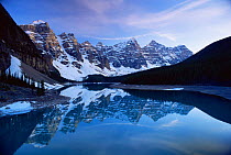 Peaceful reflections in Morraine lake, Banff NP, Alberta, Canada