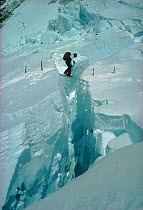 Leo Dickinson crossing crevass, Everest 1978, Nepal