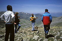 David Attenborough playing Spanish guitar on location for BBC programme "The First Eden", Soria, Spain, June 1986