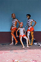 Children performers dressed up in tiger & leopard costumes for tiger festival, Udipi, Karnataka, India
