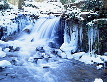 Small cascade on River Frome during winter, Somerset, UK.