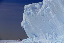 Icebreaker RRS Bransfield moored near Brunt Ice Shelf cliffs (30m high), Antarctica