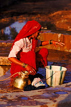 Women collecting well water. Jatoli Village, Uttar Pradesh, India