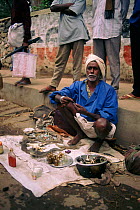 Medicine man sells Spiny tailed lizards {Uromastyx hardwicki}, Tamil Nadu India