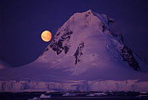 Moon rising over Lemaire Channel, Antarctic Peninsula