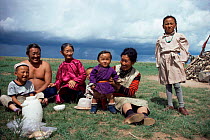 Mongolian family having a summer picnic, Hangay mountains, Mongolia.