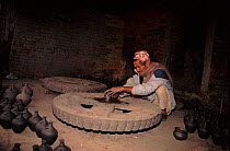 Potter working in Potter's Square, Bhaktapur, Nepal.