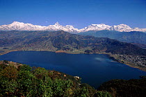 Lake Phewa Tal, the town of Pokhara and the western Himalayas beyond, Nepal.