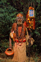 Sadhu holy man with human skull Agra, India