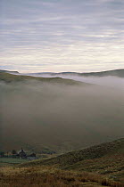 Looking down into Elan valley, covered by mist in Autumn, Mid Wales, UK