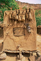 Dogon wildcat fetishes on grain store, Mali, North Africa